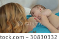 Adorable naked infant child breastfeeding - Stock Footage 