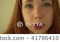 Positive red-haired girl smiles - Stock Footage [41786410]
