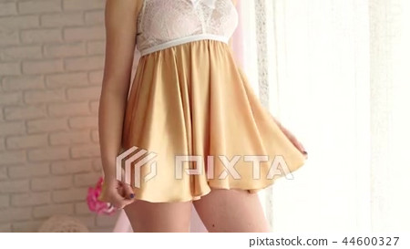 Erotic young girl in sexy short negligee stands... - Stock Footage [44600327] - PIXTA 