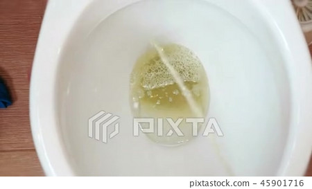 Peeing in toilet, first person view. Stream of... - Stock Footage