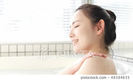 A woman taking a bath - Stock Footage