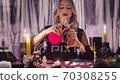 Dark magic voodoo witch performing ritual and... - Stock Footage [70308255]