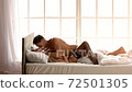 Young couple in bed. - Stock Footage [72501305]