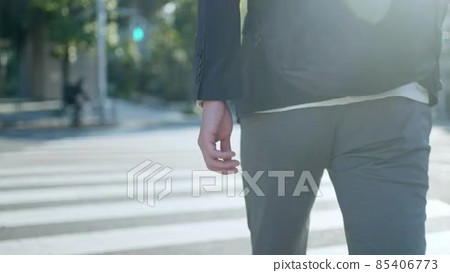 Series Video_Back view of walking man / Slow... - Stock Footage