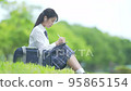 Junior high school girls in uniform using a tablet - Stock Footage [95865154]