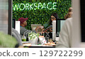 Digital, tech company and coworking business team pass a tablet with online client information. IT, technology and iot gen z staff group with b2b and web data in a futuristic startup working space 129722299