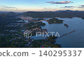 A panoramic aerial view of Sukumo Bay and its islands at sunset. A panoramic aerial view of Sukumo Bay and its islands at sunset. 140295337